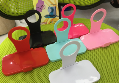 Mobile phone charging holder